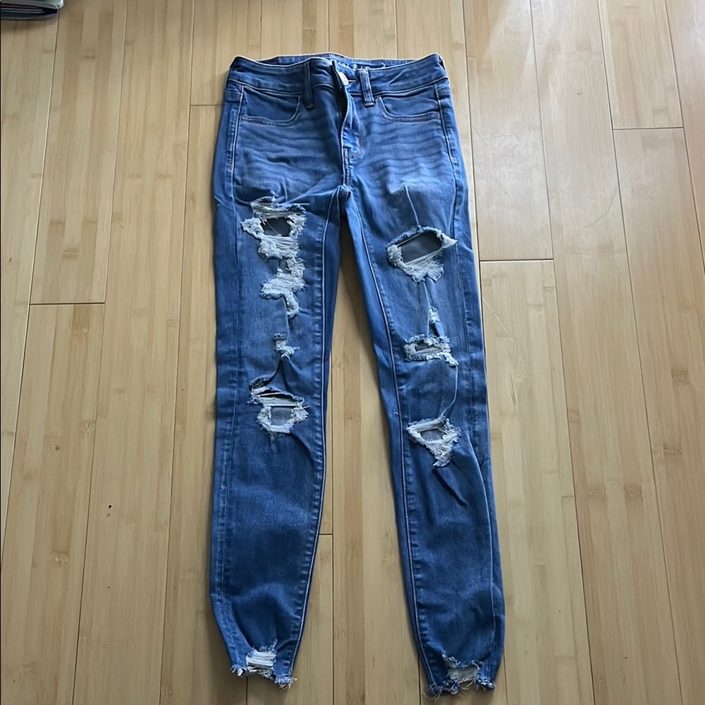Distressed Blue Denim Jeans